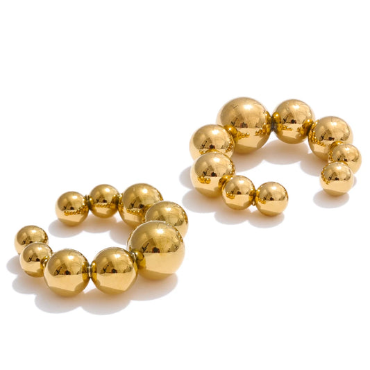 Beaded ear cuff, gold tone, on a light background – Charmhabit