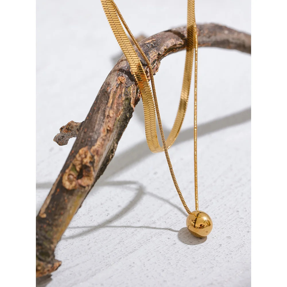 Double-layer necklace with a drop pendant, gold tone, on a branch – Charmhabit