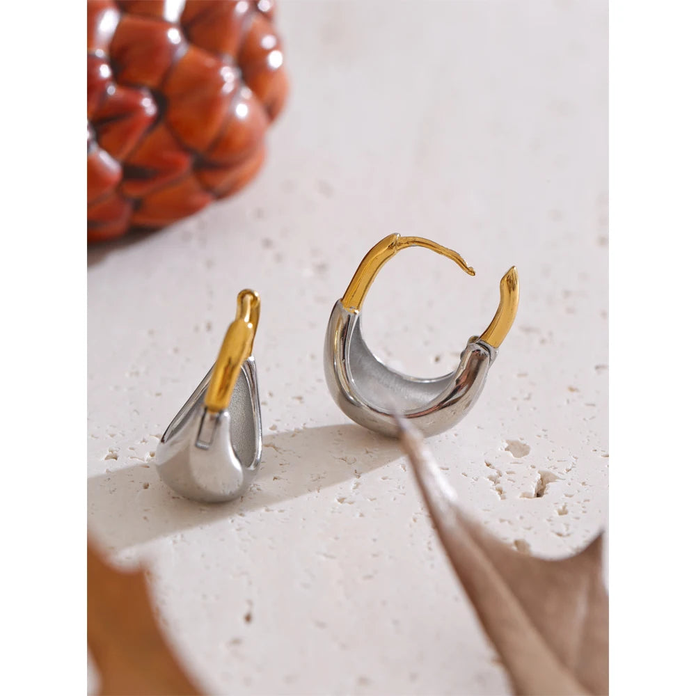 Two-tone dome huggie hoops, styled shot – Charmhabit