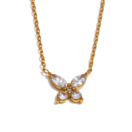Butterfly necklace with cubic zirconia in a gold tone, on a light background – Charmhabit