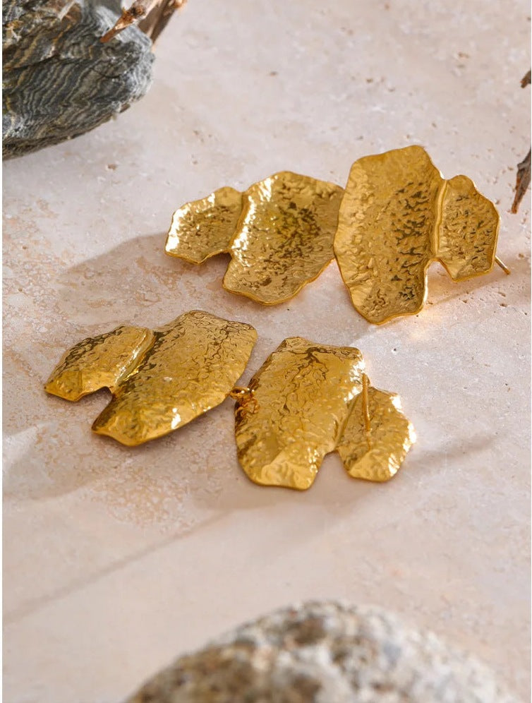 Hammered statement drop earrings, on light-coloured stone – Charmhabit