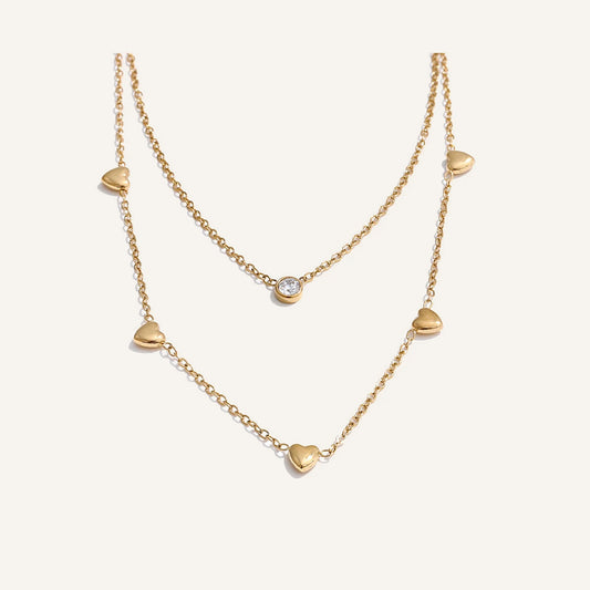 Zweilagige Halskette mit Herzen und Zirkonia, goldfarben – Charmhabit