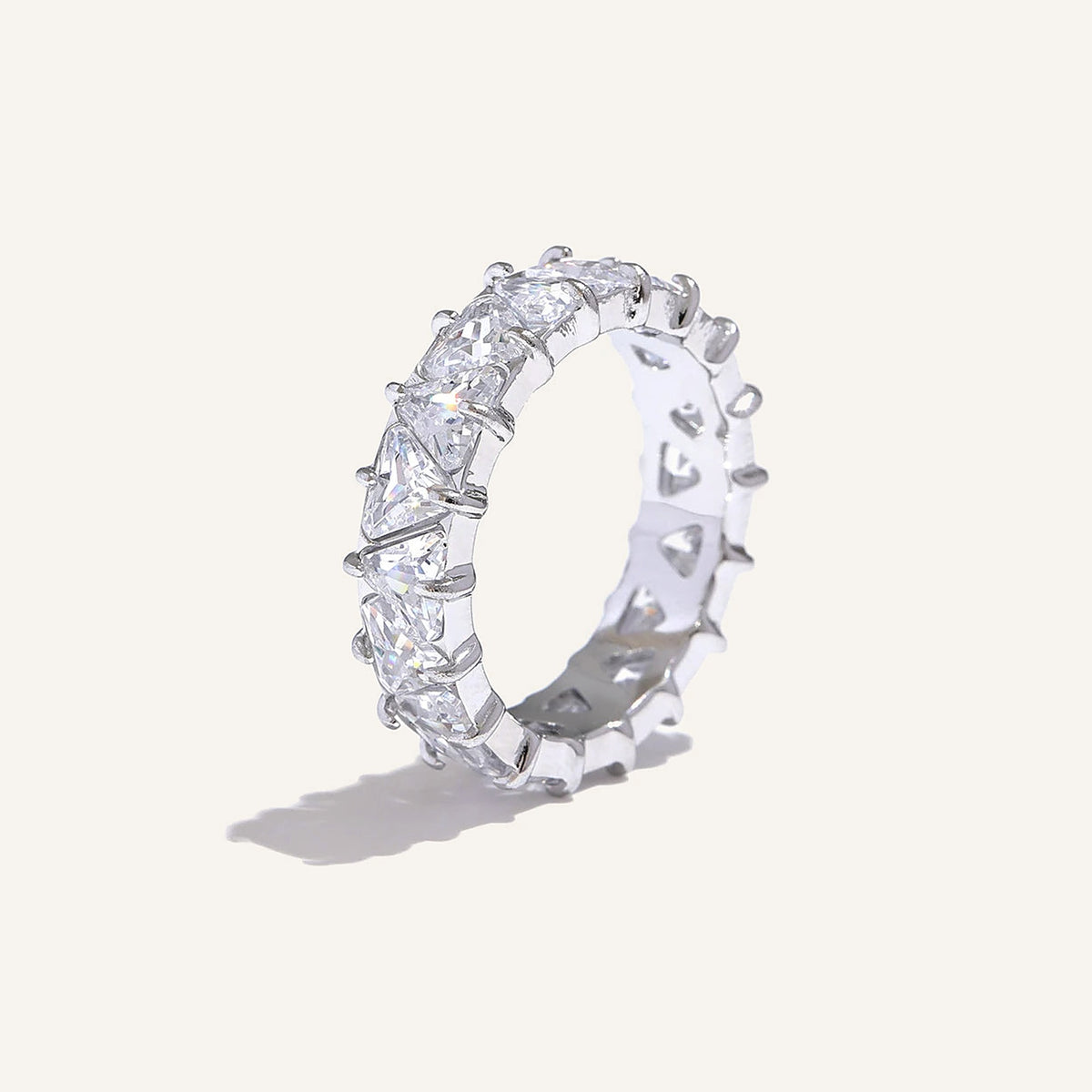 Ring with cubic zirconia hearts, silver tone, on a light background – Charmhabit