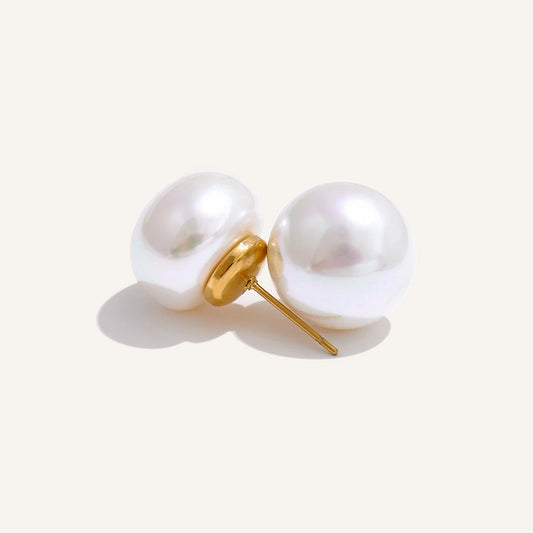 Round faux pearl stud earrings, 12 mm, on a light background – Charmhabit