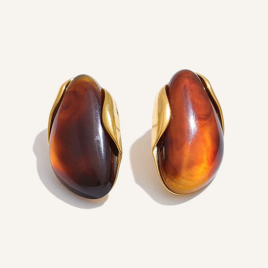 Statement resin stud earrings, amber, on a light background – Charmhabit