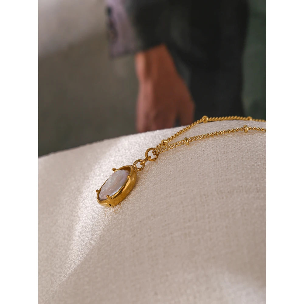 Necklace with pearl and cubic zirconia pendant, styled shot – Charmhabit