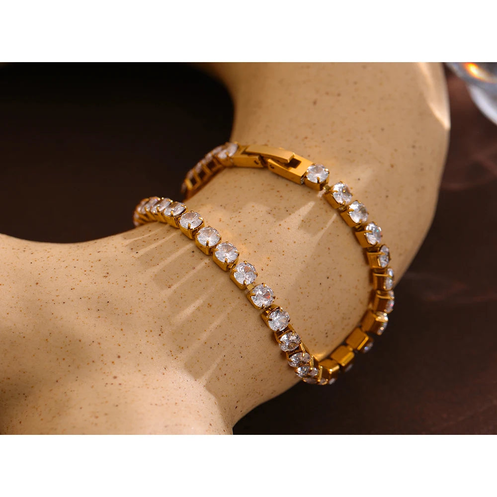 Bracelet tennis avec zircons, doré, sur de la poterie – Charmhabit