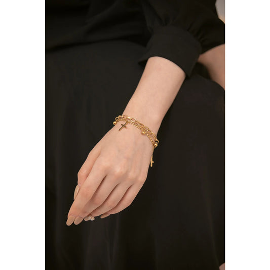 Double-layer bracelet with cross charms, worn – Charmhabit