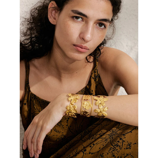 Adjustable floral cuff, worn – Charmhabit