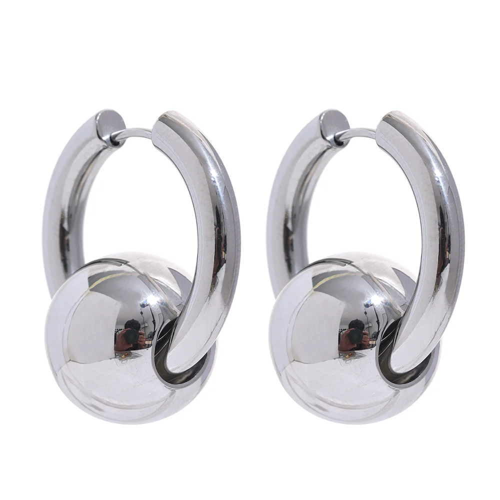 Hoop earrings with a gold or silver tone sphere, silver, on a light background – Charmhabit
