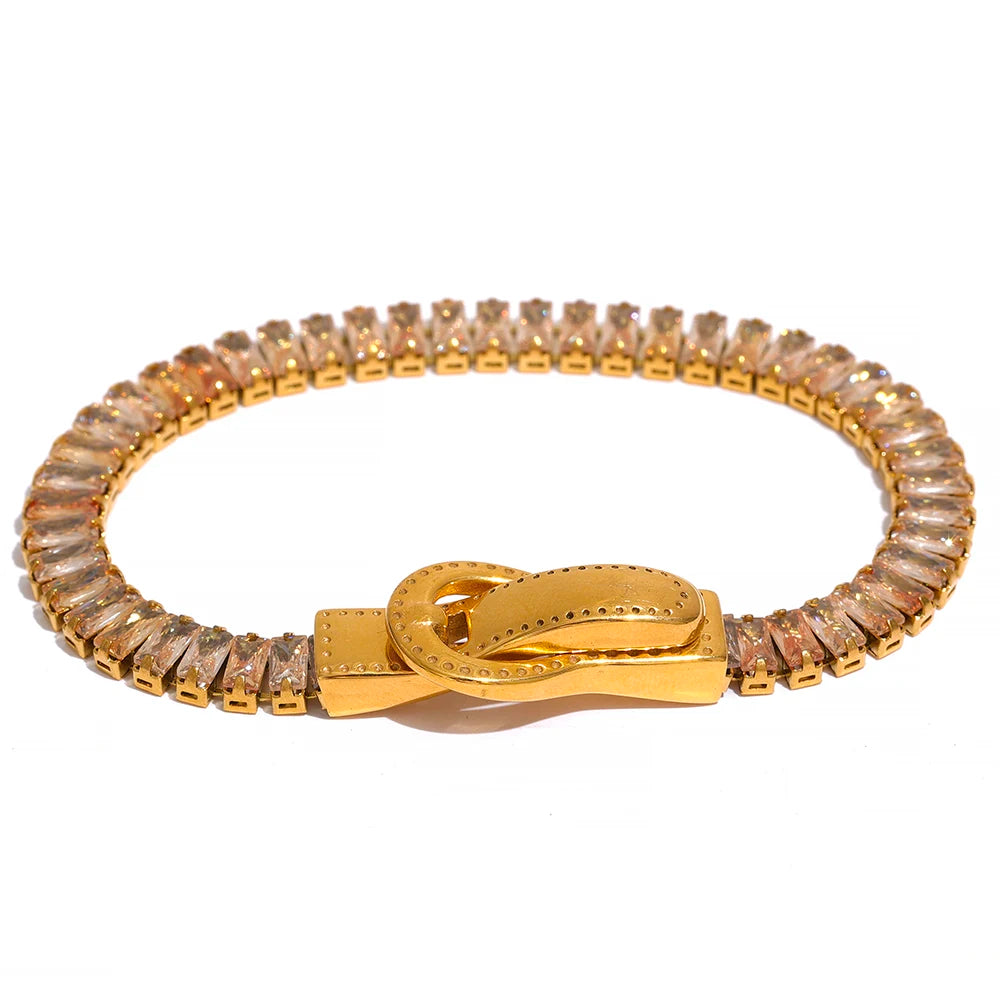 Bracelet with coloured cubic zirconia and knot clasp, champagne – Charmhabit