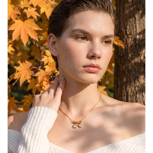 Necklace with heart and star charms, worn – Charmhabit