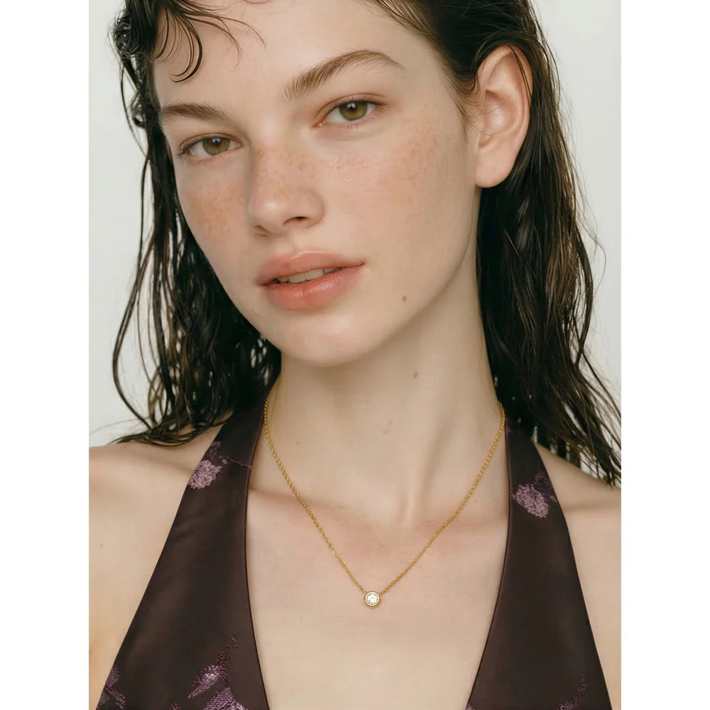 Fine necklace with round cubic zirconia pendant worn – Charmhabit