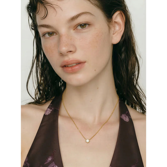 Fine necklace with round cubic zirconia pendant worn – Charmhabit