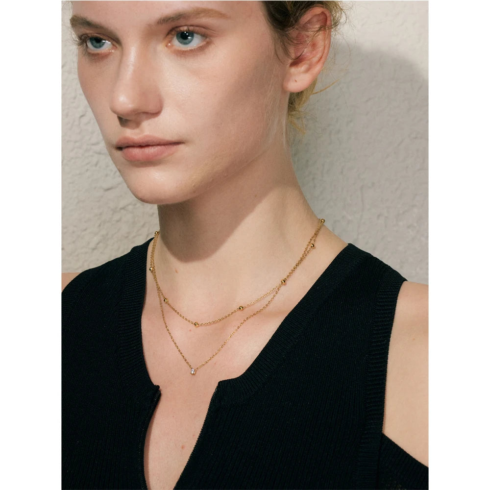 Dubbele ketting met zirkonia, gedragen – Charmhabit