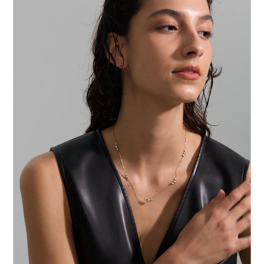 Delicate necklace with cubic zirconia stones, worn – Charmhabit
