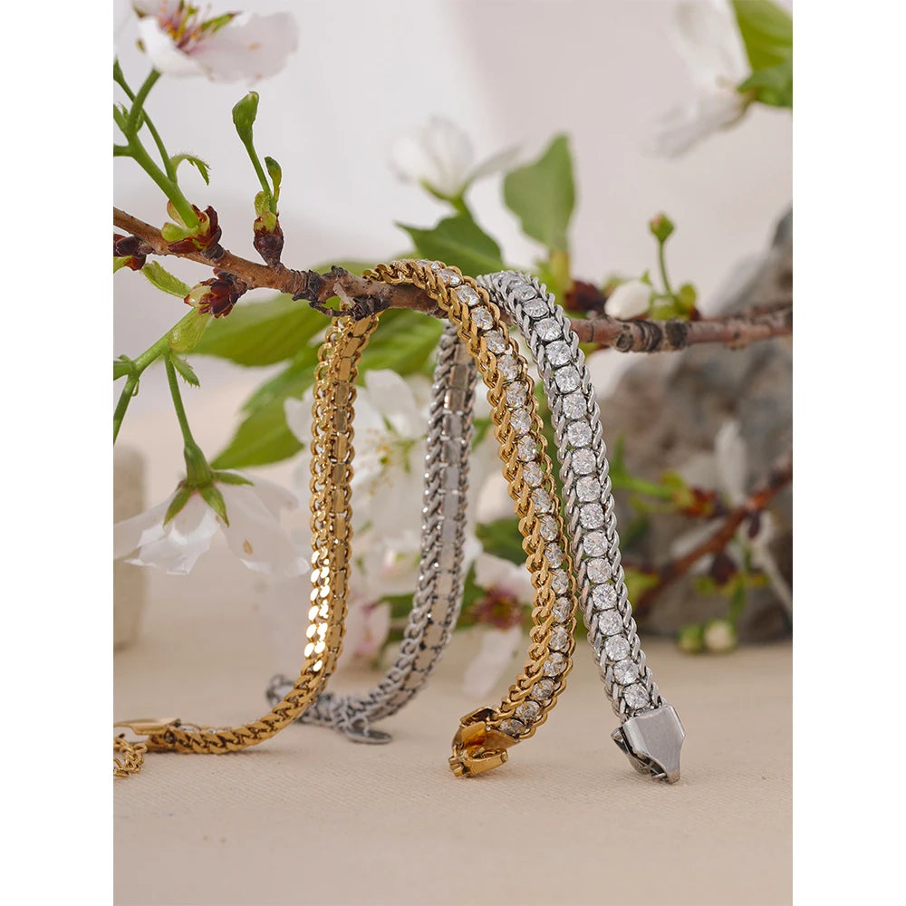 Schakelarmband met zirkonia, goud en zilver, aan een tak – Charmhabit