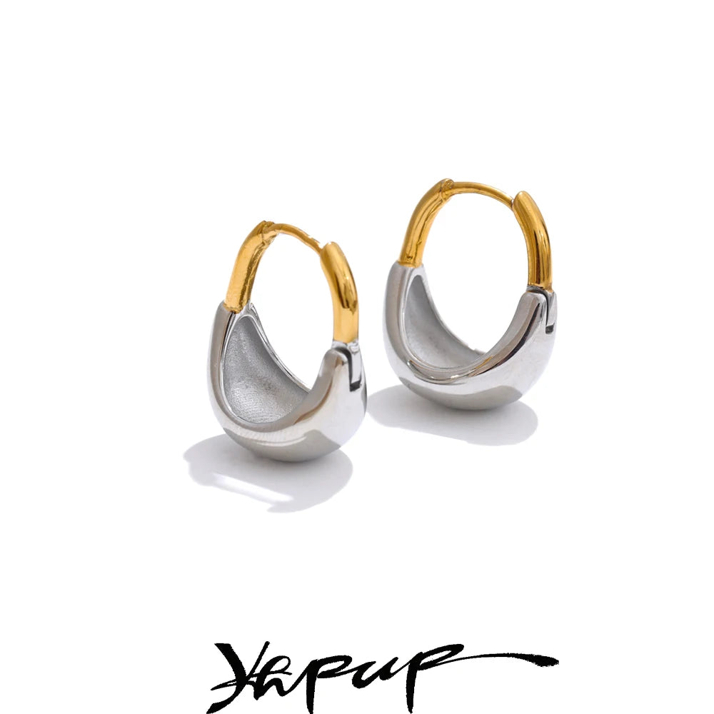 Two-tone dome huggie hoops, on a light background – Charmhabit