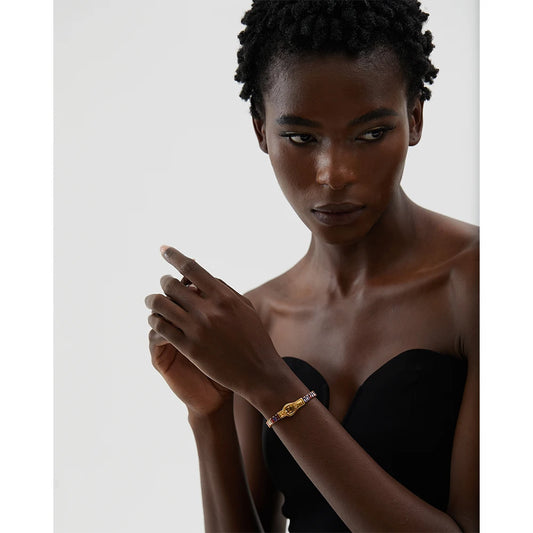 Bracelet with coloured cubic zirconia and knot clasp, worn – Charmhabit
