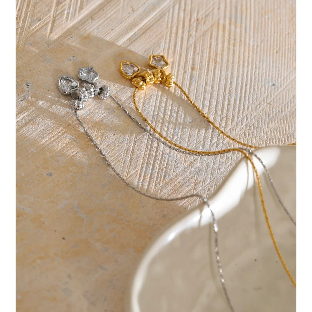 Necklace with heart and star charms, gold and silver tone, on stone – Charmhabit