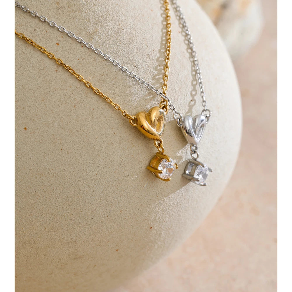 Necklace with a small cubic zirconia heart styled shot – Charmhabit