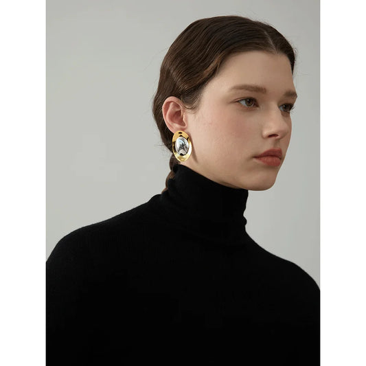 Smooth two-tone oval stud earrings, worn – Charmhabit