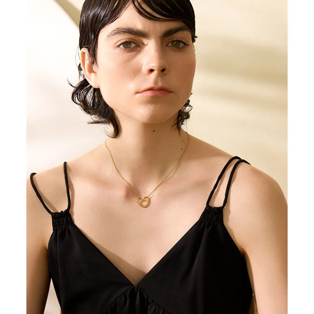Necklace with open heart, worn – Charmhabit
