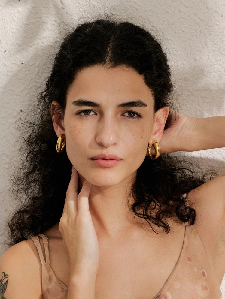 Chunky C-shaped hoop earrings, worn – Charmhabit