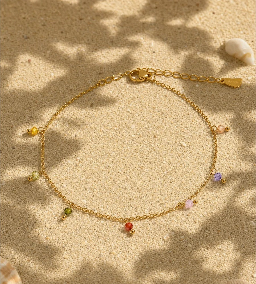 Anklet with colourful beads on sand – Charmhabit