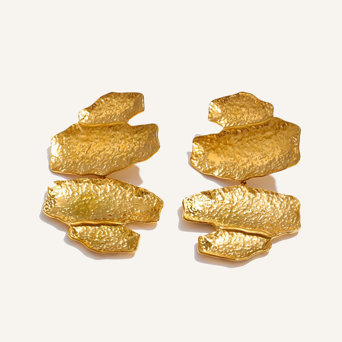 Hammered statement drop earrings, on a light background – Charmhabit