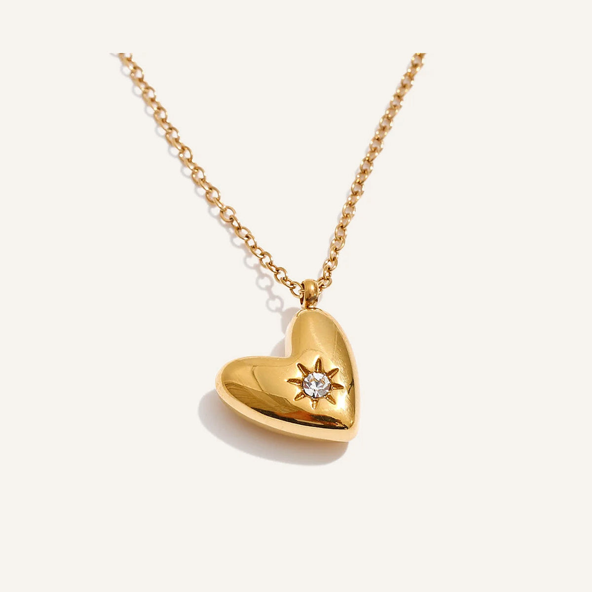 Ketting met gebold hartje kleur goud – Charmhabit