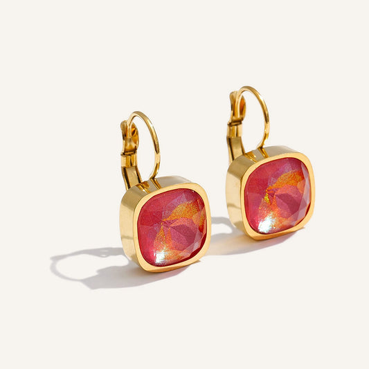 Square crystal earrings in soft colours, red, on a light background – Charmhabit
