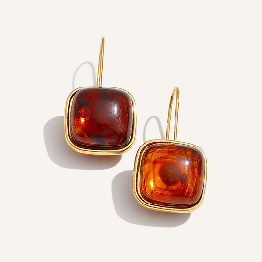 Square resin stone drop earrings, amber, on a light background – Charmhabit