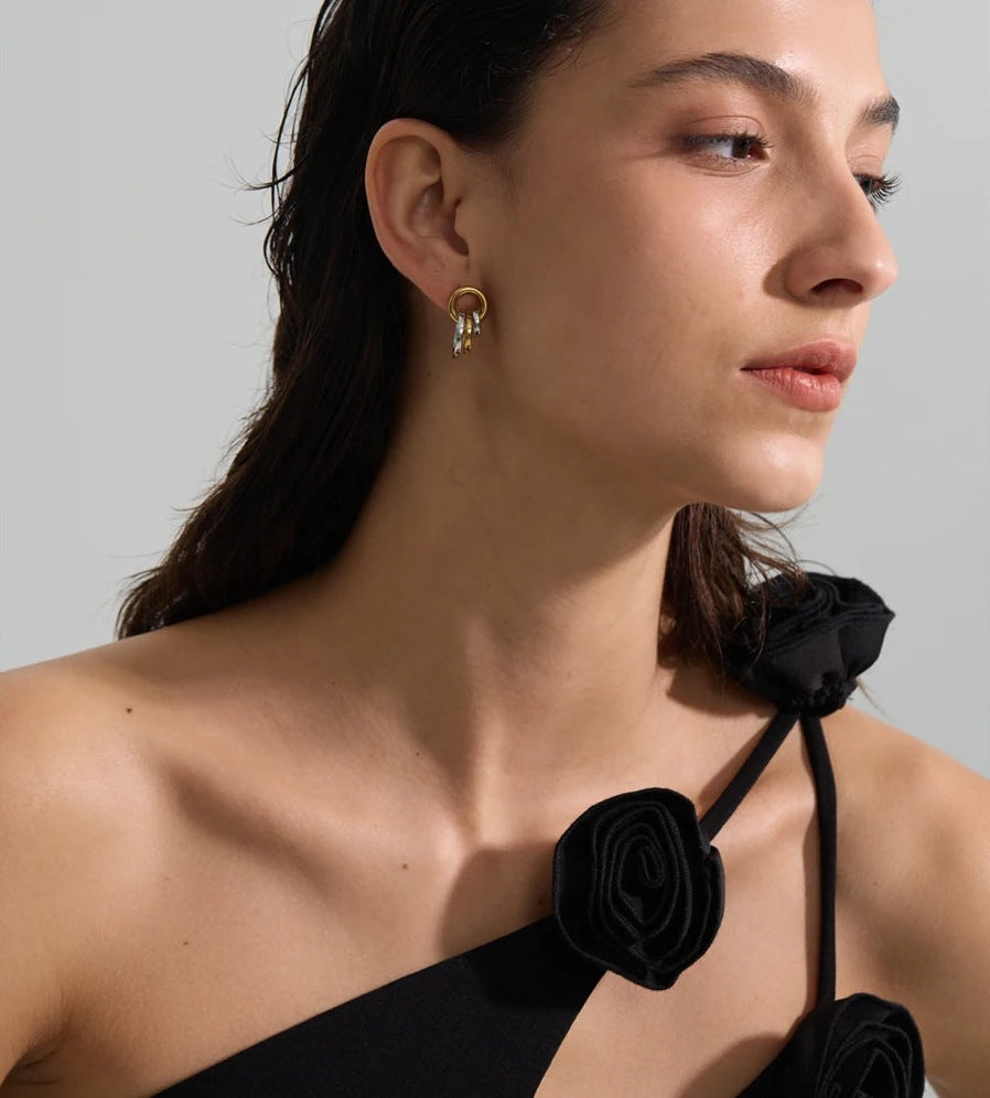 Intertwined circle stud earrings, worn – Charmhabit