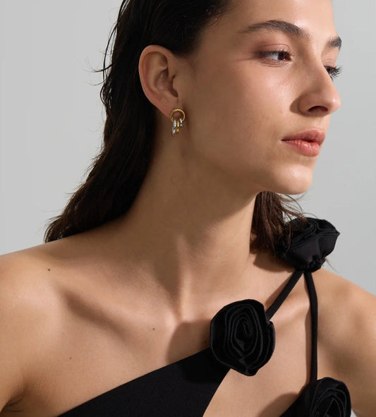 Intertwined circle stud earrings, worn – Charmhabit