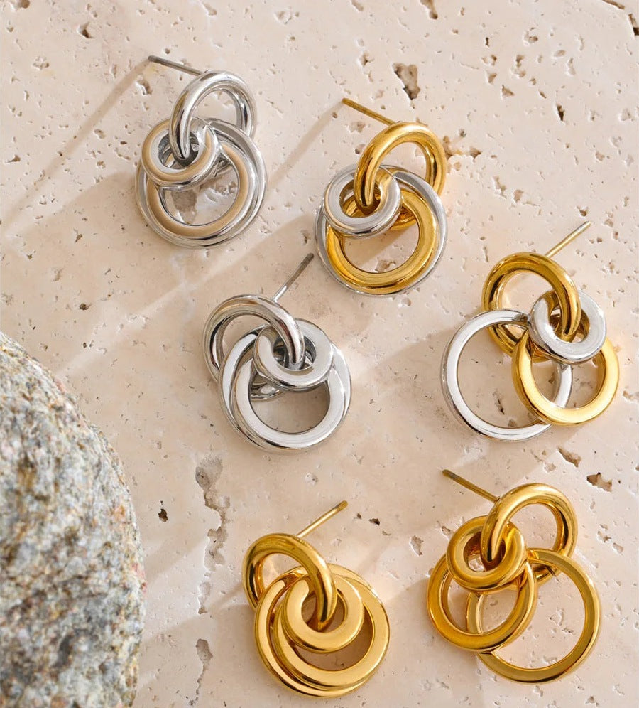 Intertwined circle stud earrings in gold tone, silver tone and mixed finish on stone – Charmhabit