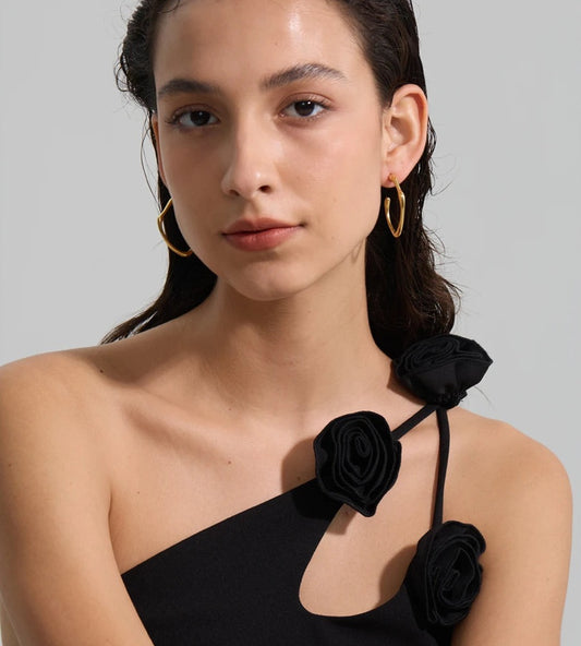 Open C-shaped earrings with a soft curve, worn – Charmhabit
