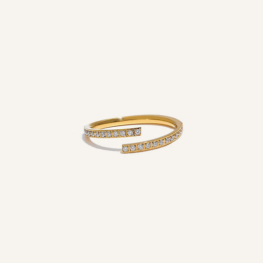 Adjustable open ring with fine cubic zirconia, gold tone, on a light background – Charmhabit