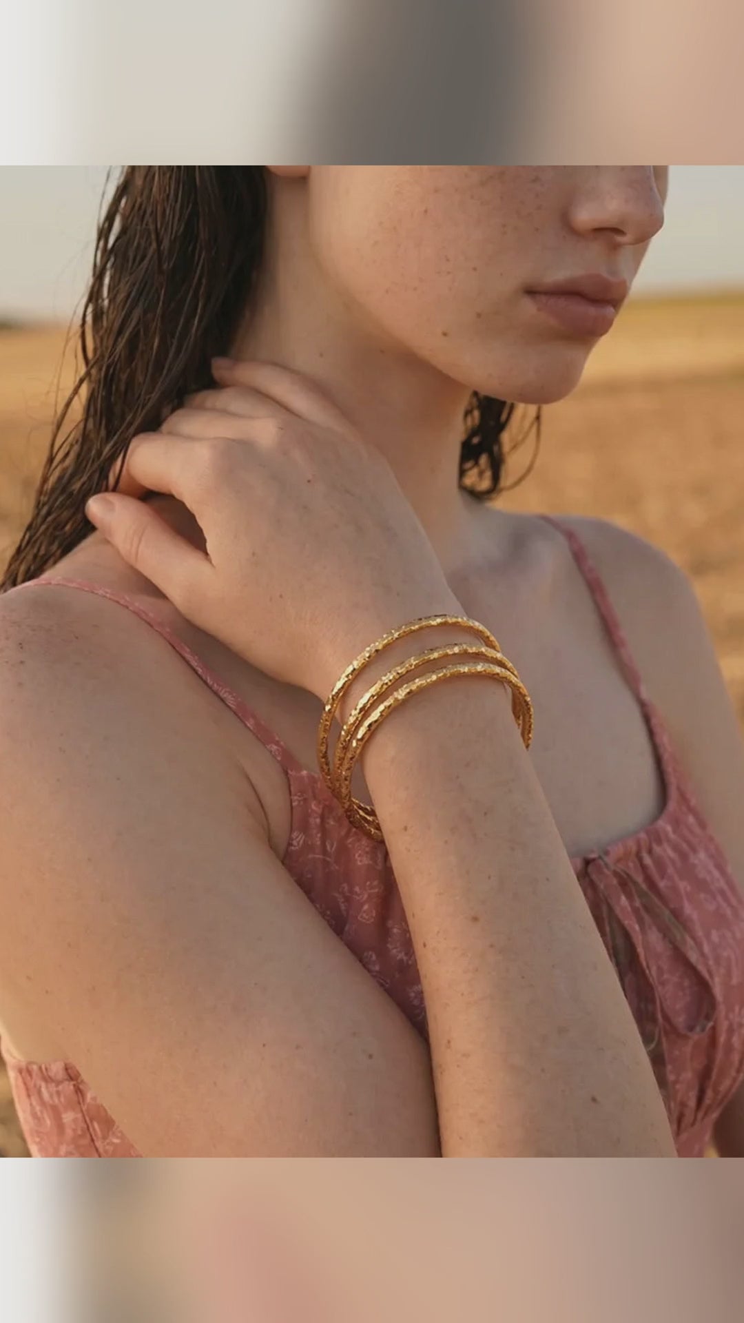 set-drie-gedraaide-armbanden