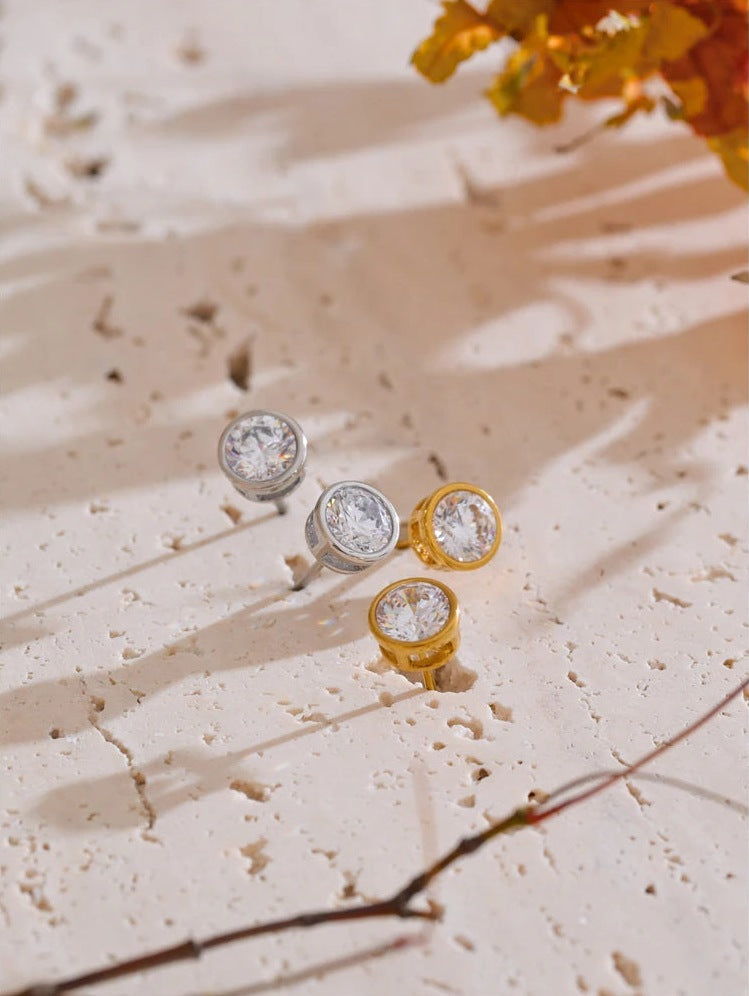 Round cubic zirconia stud earrings, styled shot with an autumn leaf – Charmhabit