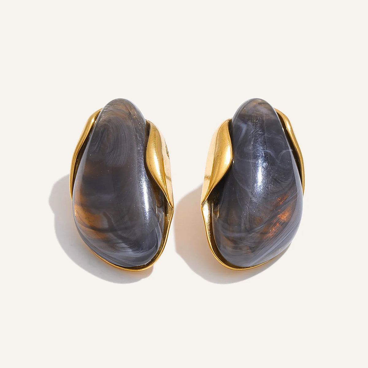 Statement resin stud earrings in anthracite on a light background – Charmhabit