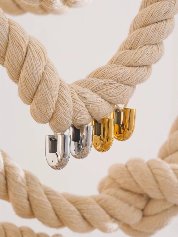 Sturdy U-shaped hoop earrings, silver tone and gold tone, styled shot – Charmhabit