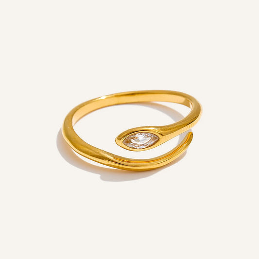 Adjustable ring with cubic zirconia, gold tone, on a light background – Charmhabit
