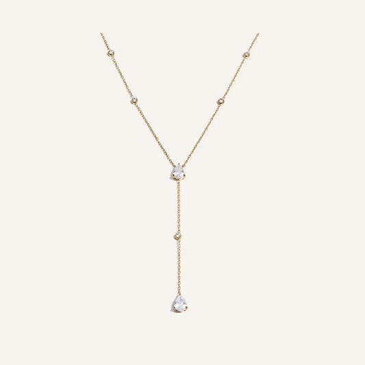 Y-ketting met druppelhanger, goud, op een lichte achtergrond – Charmhabit