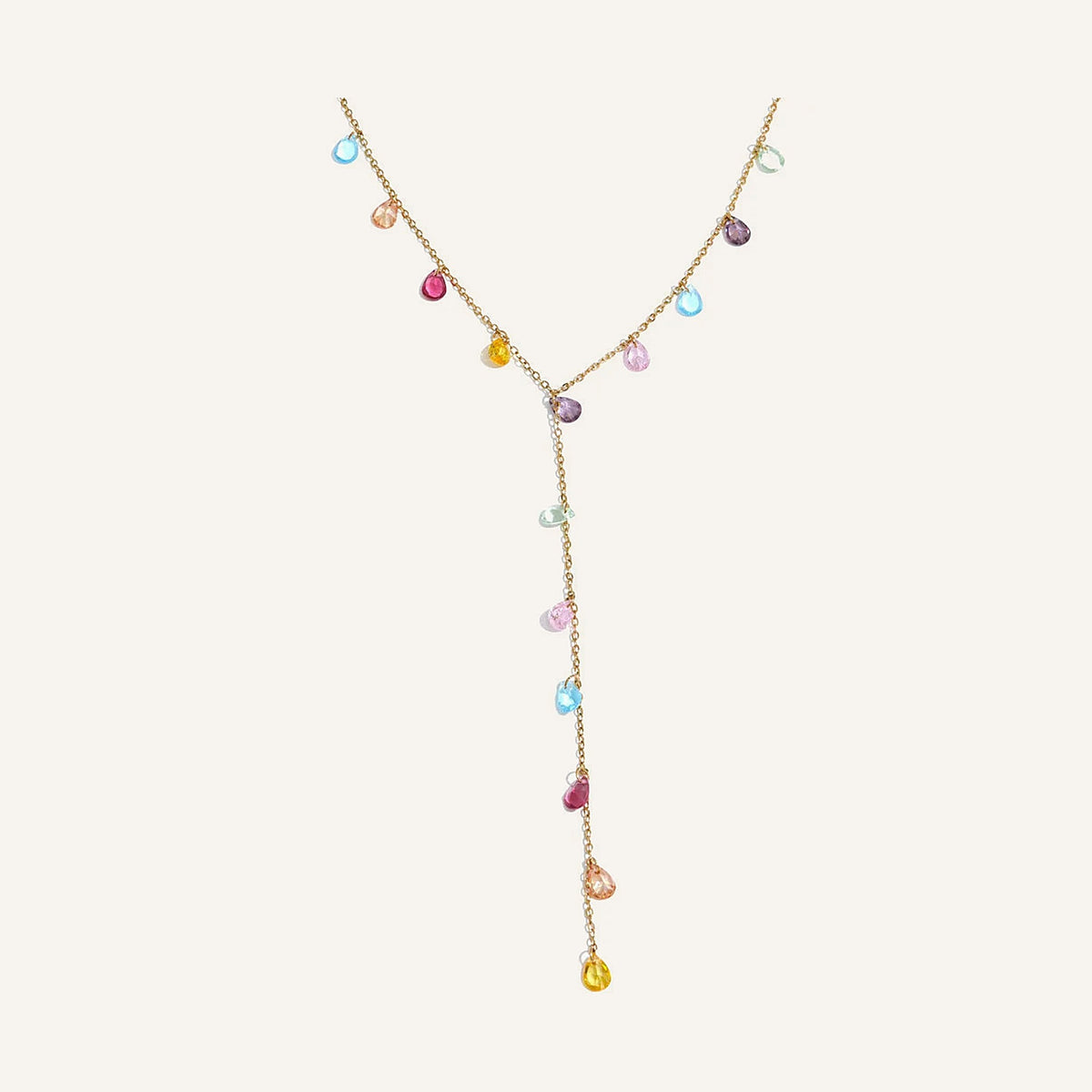 Y-ketting met kleurige zirkonia, kleurrijk, op een lichte achtergrond – Charmhabit