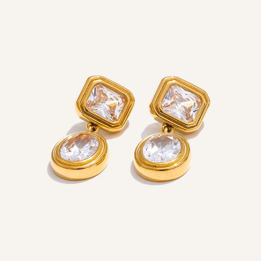 Square and oval cubic zirconia drop earrings, on a light background – Charmhabit