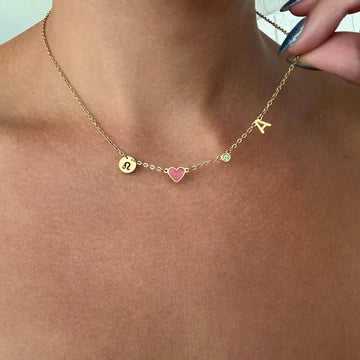 Hartjesketting met initiaal en geboortesteen